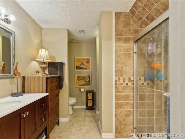 31990 S 624th Pl Unit 48, Grove, OK 74344 - full bath with vanity, a stall shower, a textured ceiling, and tile patterned floors