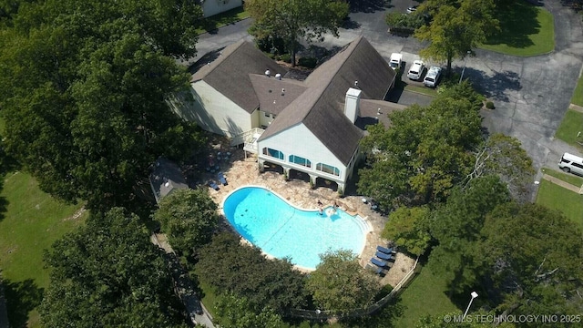31990 S 624th Pl Unit 48, Grove, OK 74344 - aerial view of property and surrounding area featuring a pool
