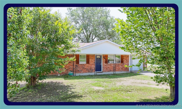 3700 Bloomfield Loop, Ada, OK 74820 - view of front of home featuring brick siding, a front lawn, and covered porch