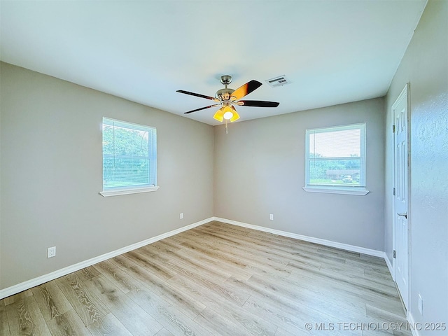3700 Bloomfield Loop, Ada, OK 74820 - empty room featuring wood finished floors and ceiling fan
