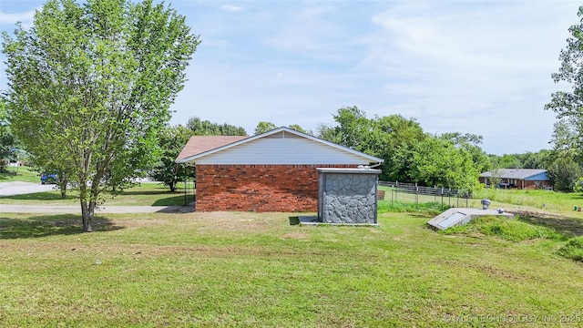 3700 Bloomfield Loop, Ada, OK 74820 - view of home's exterior featuring brick siding