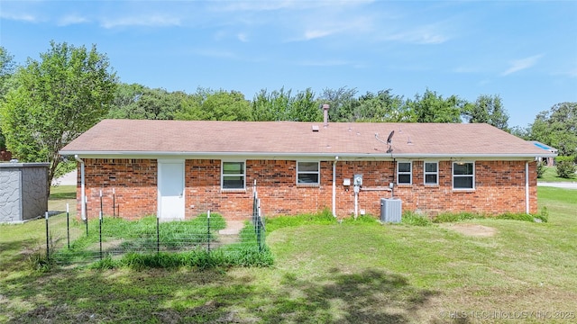 3700 Bloomfield Loop, Ada, OK 74820 - back of property featuring a yard and brick siding