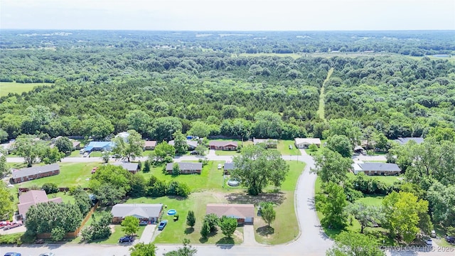3700 Bloomfield Loop, Ada, OK 74820 - aerial overview of property's location with a forest and nearby suburban area