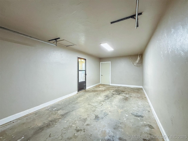 3700 Bloomfield Loop, Ada, OK 74820 - garage featuring baseboards