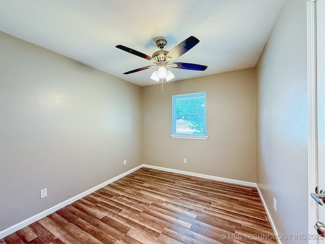 3700 Bloomfield Loop, Ada, OK 74820 - empty room with wood finished floors and a ceiling fan