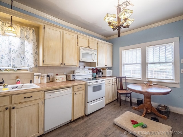 621 E Seminole Ave, Mcalester, OK 74501 - kitchen featuring white appliances, light brown cabinets, light countertops, wood finished floors, and decorative backsplash