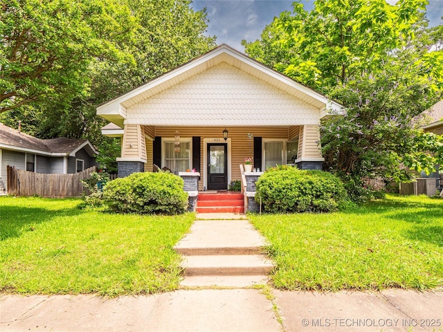 621 E Seminole Ave, Mcalester, OK 74501 - bungalow featuring a porch