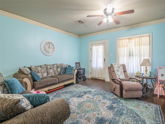 621 E Seminole Ave, Mcalester, OK 74501 - living area featuring crown molding, wood finished floors, and ceiling fan