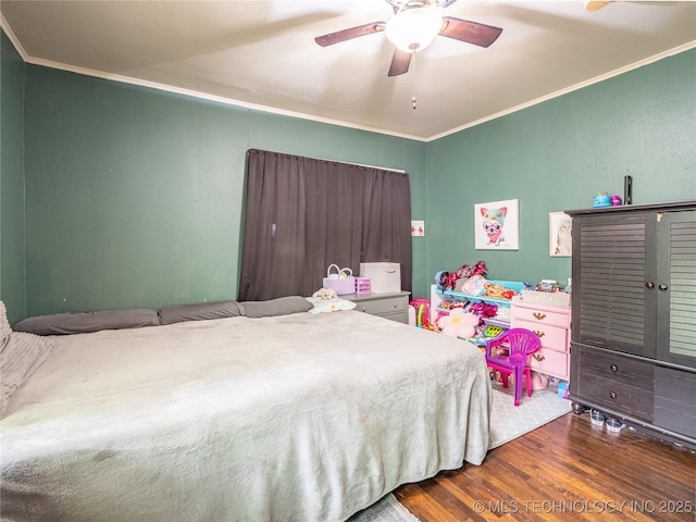621 E Seminole Ave, Mcalester, OK 74501 - bedroom featuring crown molding, wood finished floors, and ceiling fan