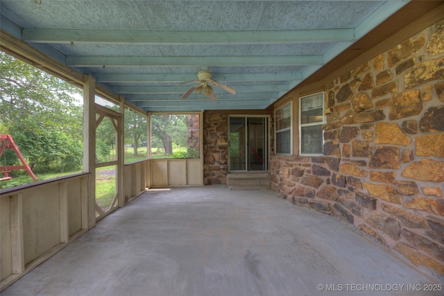 28265 Forest Ridge Rd, Sand Springs, OK 74063 - unfurnished sunroom featuring a ceiling fan, beamed ceiling, and entry steps