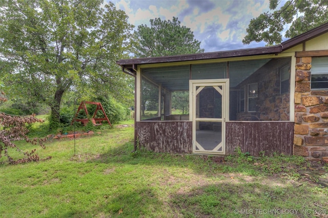 28265 Forest Ridge Rd, Sand Springs, OK 74063 - view of outdoor structure with a sunroom