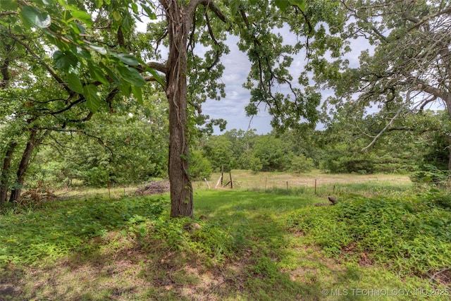 28265 Forest Ridge Rd, Sand Springs, OK 74063 - view of yard with a wooded view