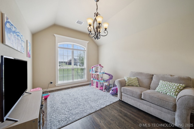 5814 130th W Ave, Sand Springs, OK 74063 - living room with wood finished floors, lofted ceiling, and a chandelier