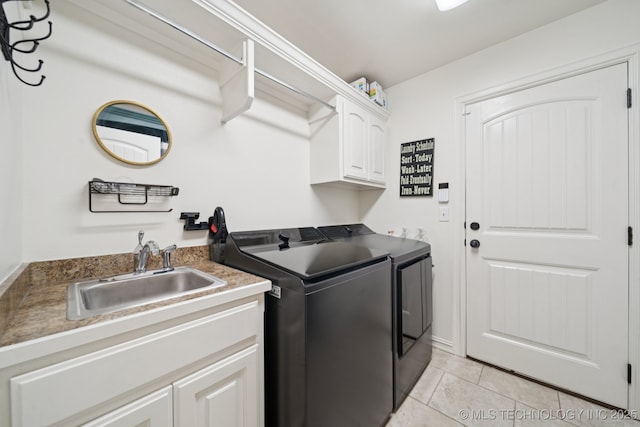 5814 130th W Ave, Sand Springs, OK 74063 - washroom with washer and dryer, cabinet space, and light tile patterned flooring