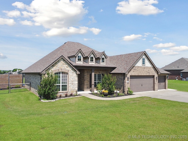 5814 130th W Ave, Sand Springs, OK 74063 - french country home with driveway, an attached garage, brick siding, stone siding, and roof with shingles