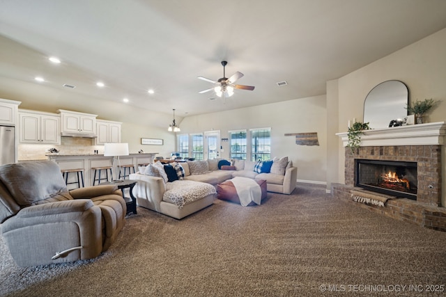5814 130th W Ave, Sand Springs, OK 74063 - living room with ceiling fan, carpet, a brick fireplace, and recessed lighting