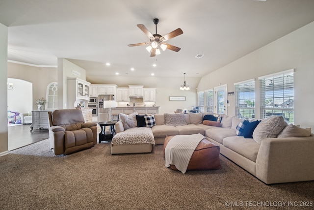 5814 130th W Ave, Sand Springs, OK 74063 - living room with a chandelier, ceiling fan, arched walkways, and recessed lighting