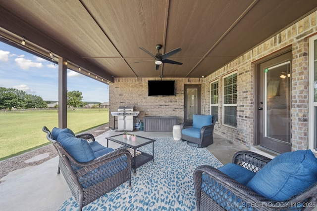 5814 130th W Ave, Sand Springs, OK 74063 - view of patio with ceiling fan, a grill, and outdoor lounge area