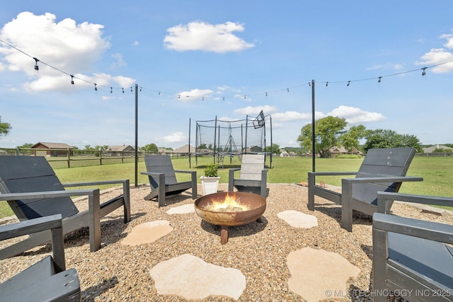 5814 130th W Ave, Sand Springs, OK 74063 - view of patio with a fire pit and a trampoline