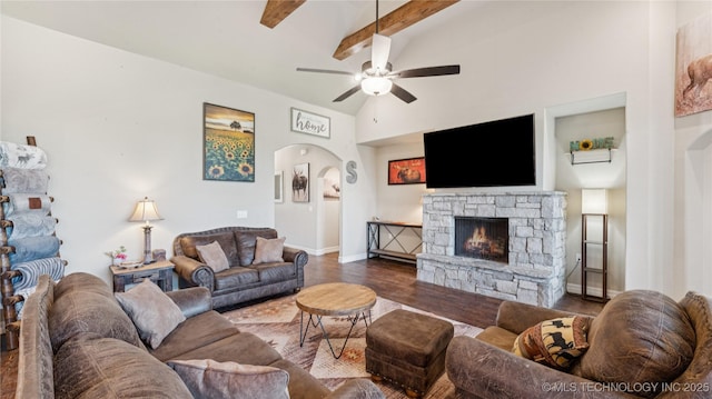 14934 S Sequoia St, Glenpool, OK 74033 - living area with a stone fireplace, arched walkways, a ceiling fan, and wood finished floors