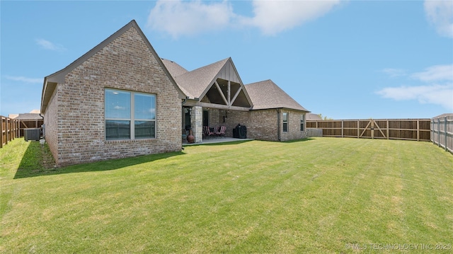 14934 S Sequoia St, Glenpool, OK 74033 - back of house with brick siding, a fenced backyard, and a patio