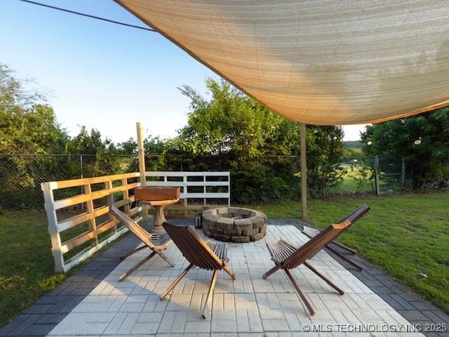 104 E 58th St, Tulsa, OK 74105 - view of patio with a fire pit