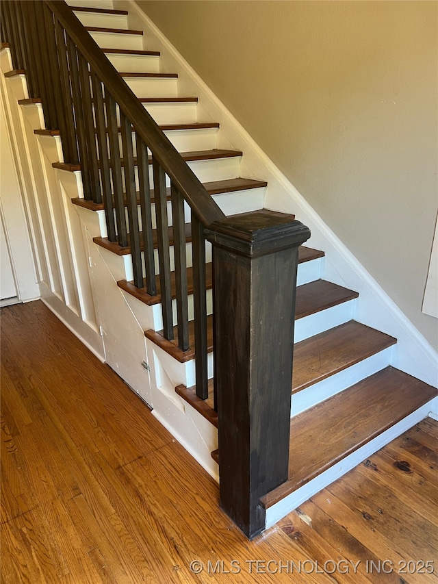 1215 S Quincy Ave, Tulsa, OK 74120 - stairs with wood finished floors