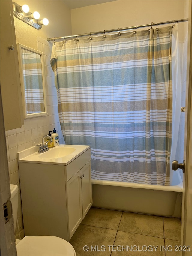 1215 S Quincy Ave, Tulsa, OK 74120 - bathroom featuring shower / tub combo with curtain, vanity, and tile patterned floors