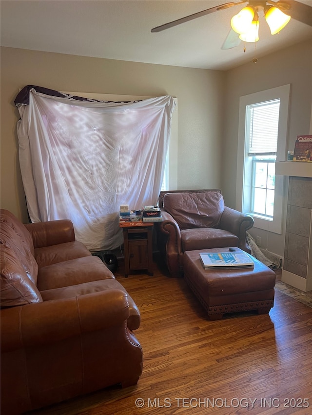 1215 S Quincy Ave, Tulsa, OK 74120 - living room with wood finished floors and a ceiling fan