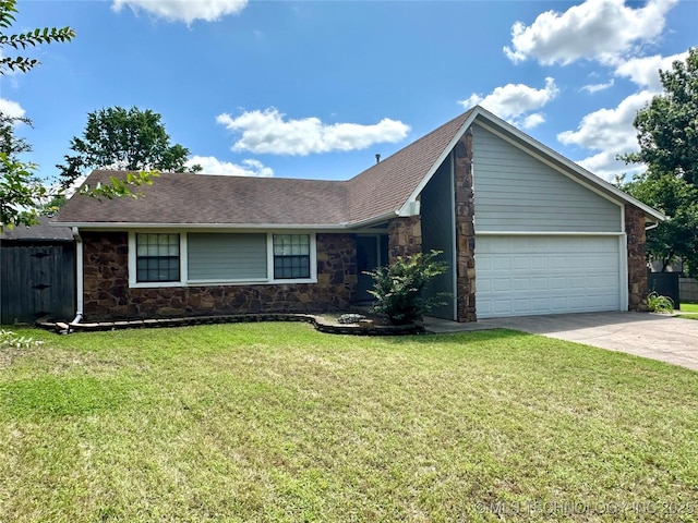 204 E 24th Ct, Owasso, OK 74055 - view of front facade with stone siding, a garage, driveway, a front yard, and roof with shingles
