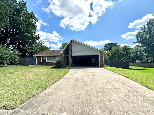 204 E 24th Ct, Owasso, OK 74055 - mid-century home with concrete driveway, an attached garage, and brick siding