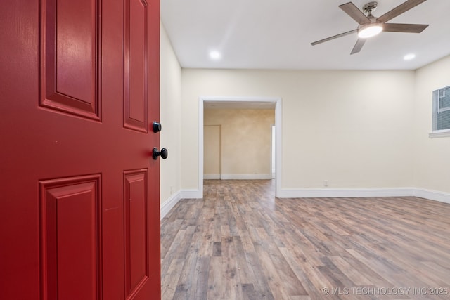 224 E Oklahoma St, Tulsa, OK 74106 - entrance foyer with wood finished floors, ceiling fan, and recessed lighting