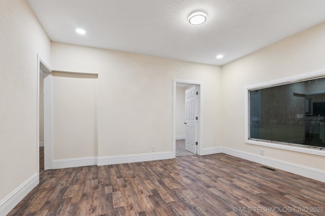 224 E Oklahoma St, Tulsa, OK 74106 - empty room featuring wood finished floors and recessed lighting