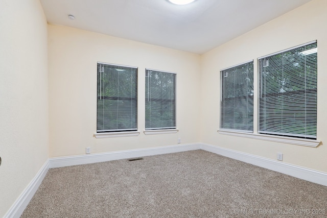 224 E Oklahoma St, Tulsa, OK 74106 - unfurnished room with carpet