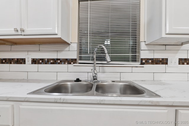 224 E Oklahoma St, Tulsa, OK 74106 - kitchen with backsplash and white cabinets