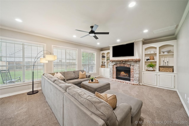 5117 E 92nd St, Tulsa, OK 74137 - living room with light carpet, crown molding, ceiling fan, recessed lighting, and a fireplace