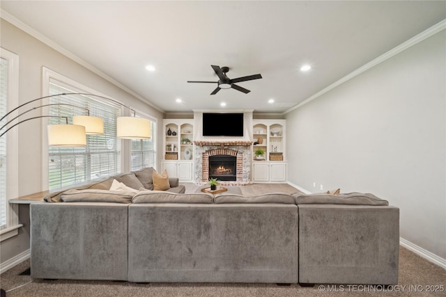 5117 E 92nd St, Tulsa, OK 74137 - carpeted living area featuring ceiling fan, a brick fireplace, recessed lighting, and ornamental molding