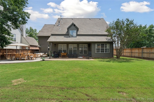 5117 E 92nd St, Tulsa, OK 74137 - back of house with an outdoor living space, a patio, a fenced backyard, and roof with shingles