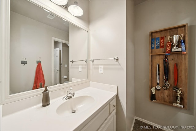 5117 E 92nd St, Tulsa, OK 74137 - bathroom featuring vanity and baseboards