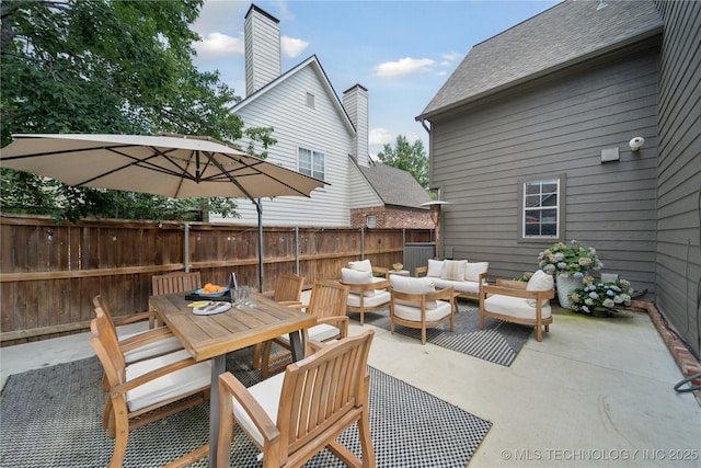 5117 E 92nd St, Tulsa, OK 74137 - view of patio with outdoor lounge area and outdoor dining space