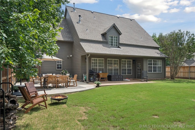 5117 E 92nd St, Tulsa, OK 74137 - back of property featuring a fire pit, a patio, a fenced backyard, and a shingled roof