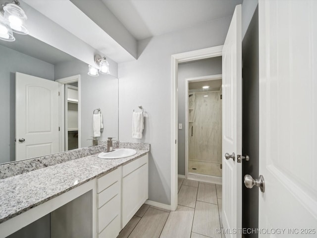 5607 E 76th St, Tulsa, OK 74136 - full bathroom featuring a stall shower and vanity
