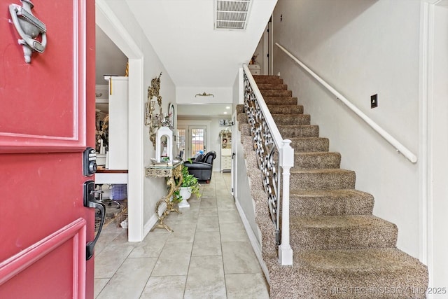 6812 E 55th St, Tulsa, OK 74145 - foyer featuring stairs and light tile patterned floors