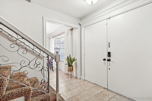 6812 E 55th St, Tulsa, OK 74145 - entrance foyer featuring light tile patterned floors and stairs