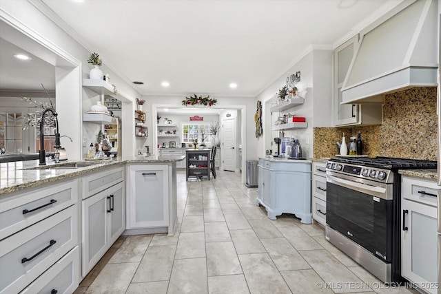 6812 E 55th St, Tulsa, OK 74145 - kitchen featuring open shelves, stainless steel gas stove, premium range hood, tasteful backsplash, and light stone countertops