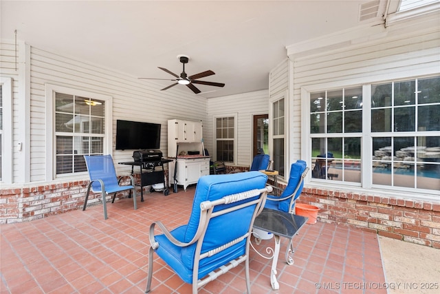501 W 35th Pl, Sand Springs, OK 74063 - view of patio featuring a ceiling fan and outdoor dining space
