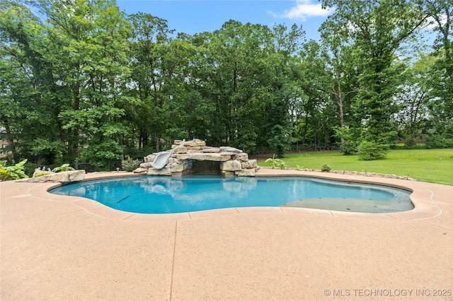 501 W 35th Pl, Sand Springs, OK 74063 - swimming pool featuring a water slide, a lawn, a patio, and view of scattered trees