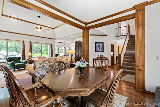 501 W 35th Pl, Sand Springs, OK 74063 - dining room with ornamental molding, healthy amount of natural light, vaulted ceiling, a ceiling fan, and stairs