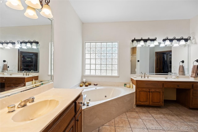 501 W 35th Pl, Sand Springs, OK 74063 - bathroom with two vanities, a whirlpool tub, tile patterned floors, and a chandelier