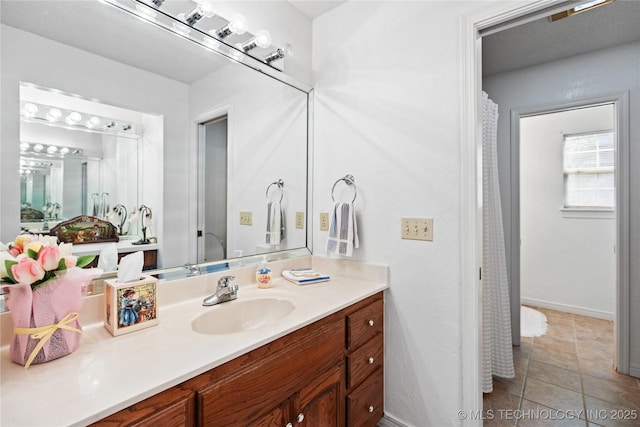 501 W 35th Pl, Sand Springs, OK 74063 - bathroom featuring vanity and baseboards